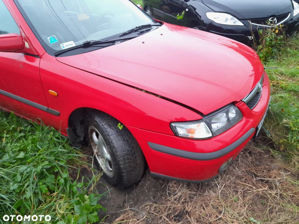Mazda 626 GF GW 97-02   Maska lampa zderzak zamrk atrapa pas w kolor SU - 1