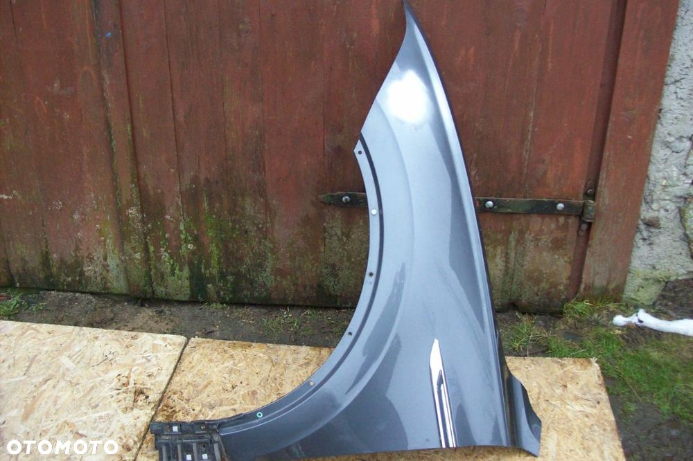 BŁOTNIK PRZEDNI LEWY VW TUAREG III - 1