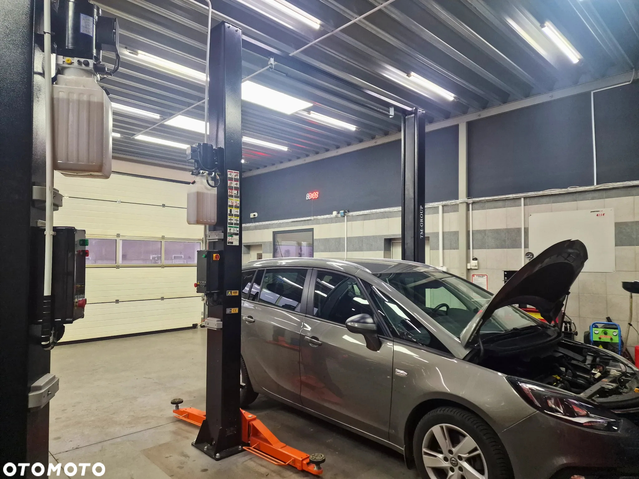 Podnośnik dwukolumnowy samochodowy łączony PODWYŻSZANY automat 4T 4,9M - 10
