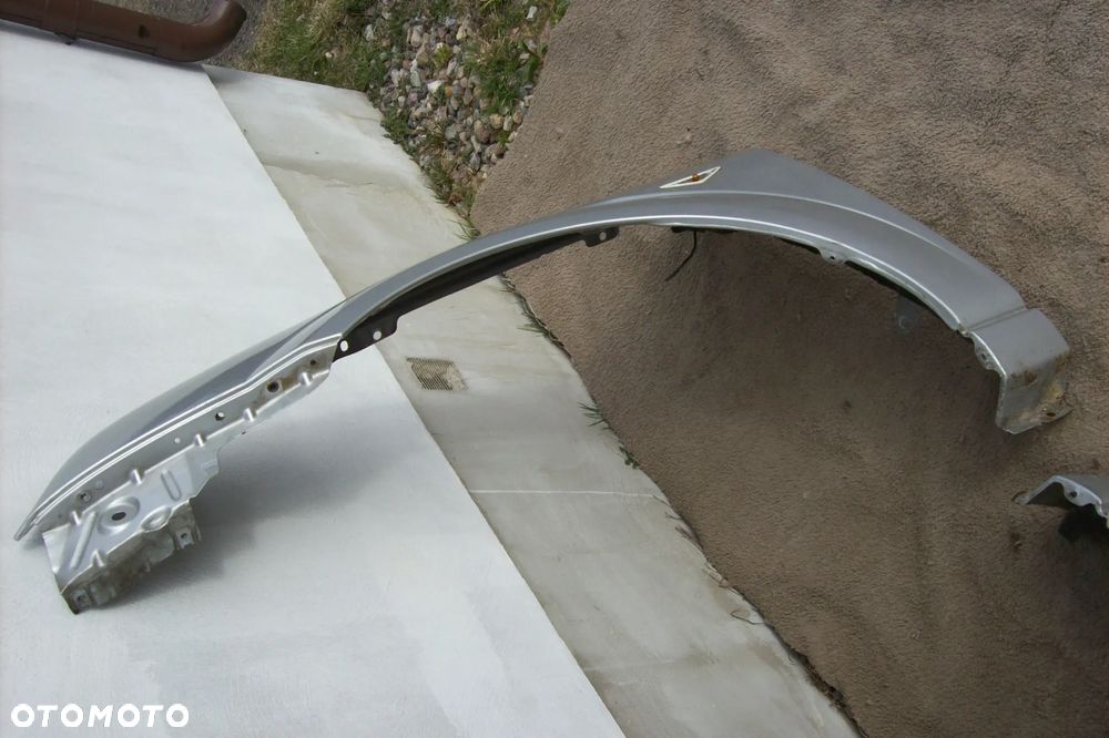 BŁOTNIK PRZEDNI LEWY  FORD MONDEO MK 3 LIFT - 4