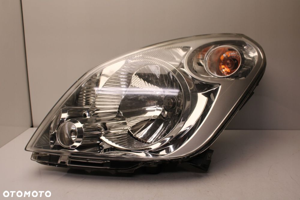 SUZUKI SPLASH 08R- REFLEKTOR LAMPA LEWY PRZÓD LEWA PRZEDNIA - 1