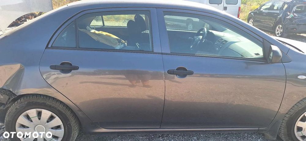 Toyota COROLLA E15 1,4D4D mcperson amortyzator prawy lewy przód - 9