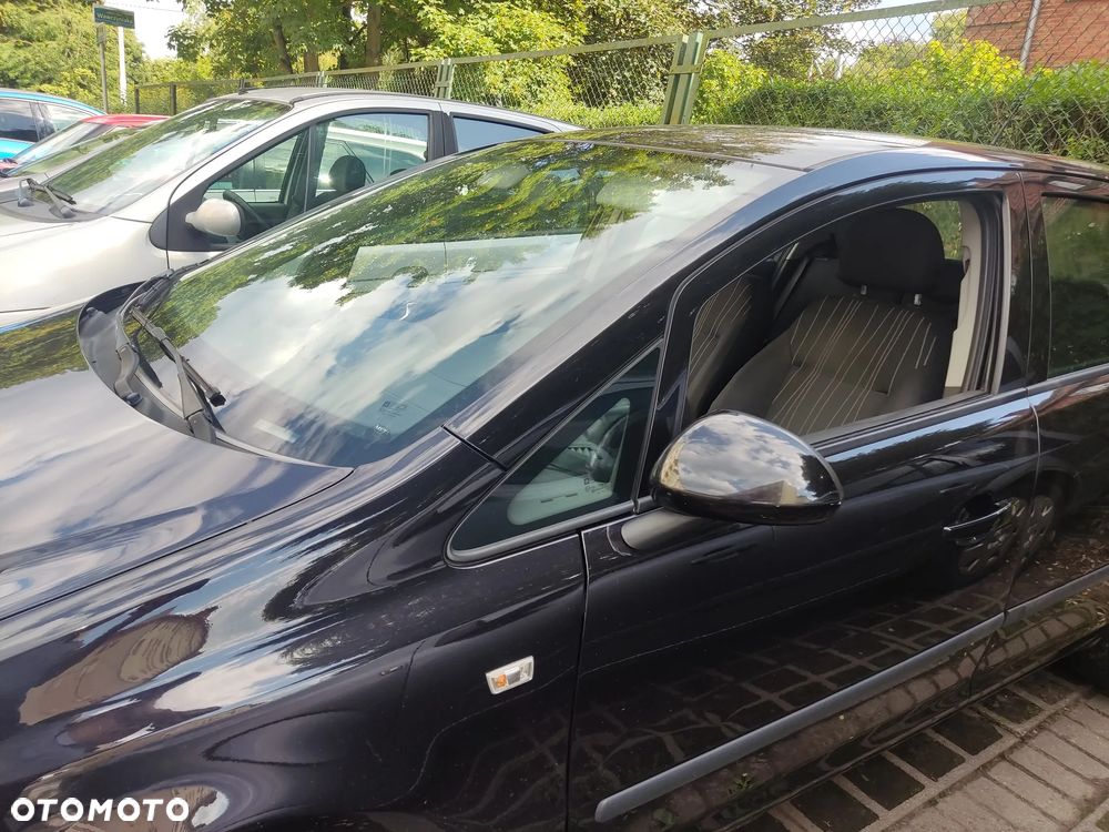 Opel Corsa 1.4 16V Enjoy - 6