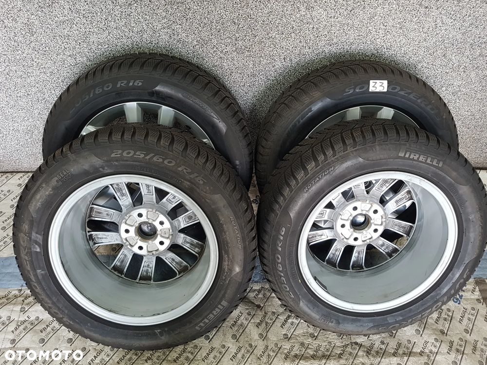 KOŁA ZIMOWE ORYGINAŁ VW GOLF TOURAN CADDY PASSAT  5X112 205/60R16 - 12