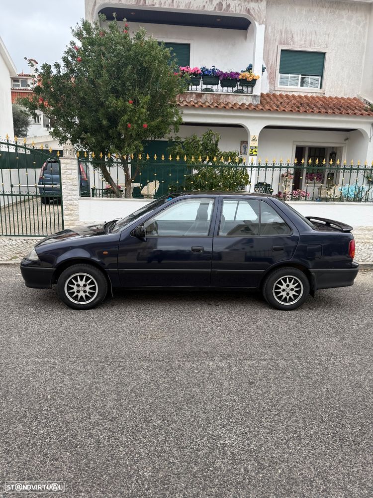 Suzuki Swift 1.3 GL Sedan - 1