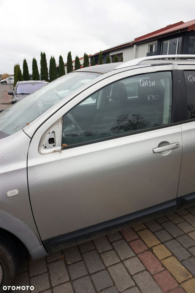 DRZWI PRZEDNIE LEWE QASHQAI+2 I J10 KY0  SREBRNY NISSAN 2008-2013 - 1