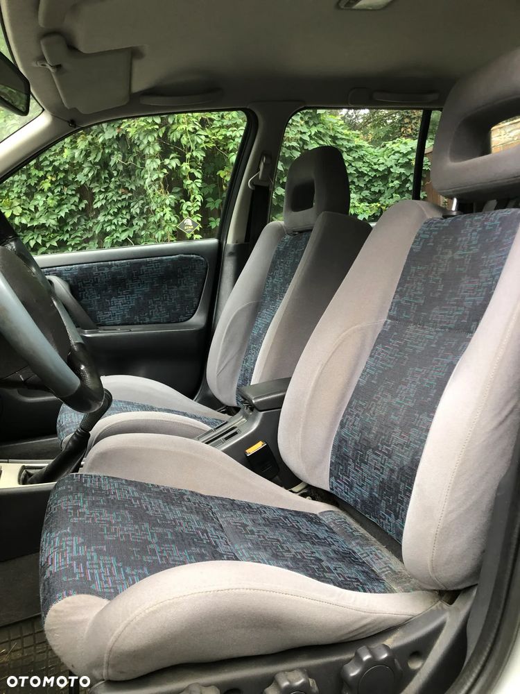 Nissan Primera 1.6 Motion - 11