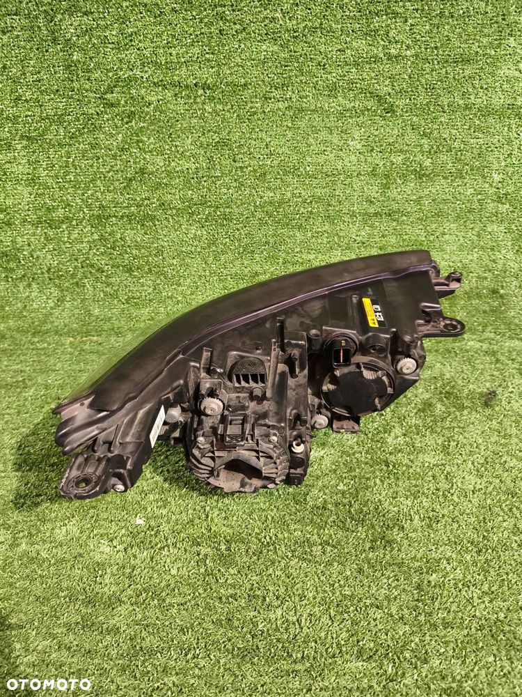 REFLEKTOR LEWY PRZÓD SSANGYONG TIVOLI 15- XENON NR.990 - 3