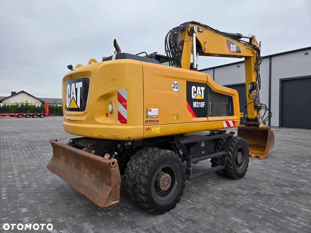 Caterpillar M318F / z Niemiec / - 4
