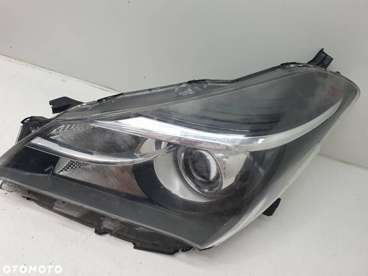 LAMPA PRZÓD LEWA SOCZEWKA EUROPA TOYOTA YARIS III LIFT 2014 - 2