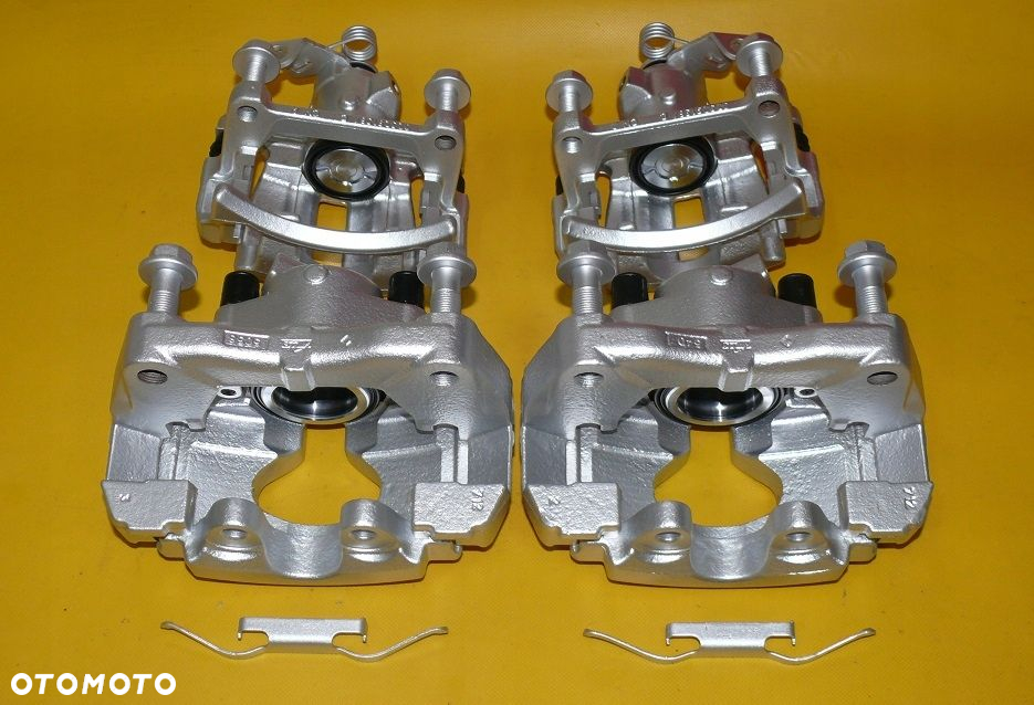 ZACISKI JARZMA LEWY PRAWY PRZÓD TYŁ VW TRANSPORTER T5 308/29,5 294/22mm 03- - 7