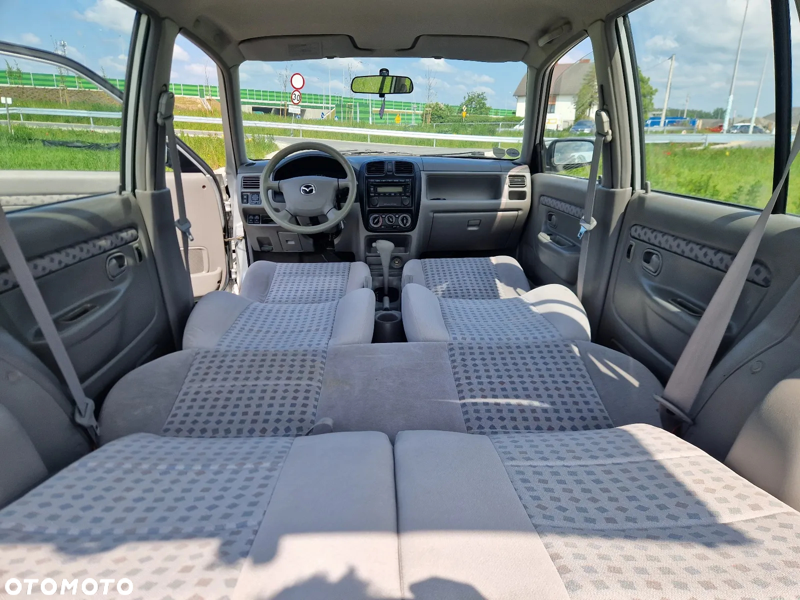 Mazda Demio - 3