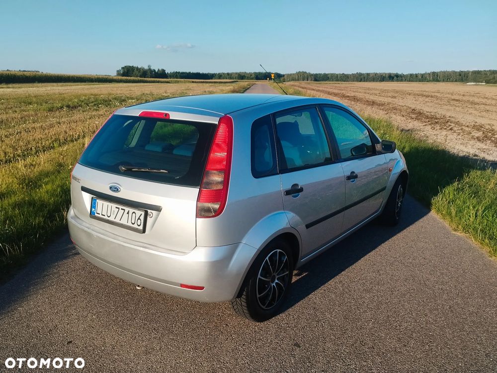 Ford Fiesta 1.4 Ghia - 4