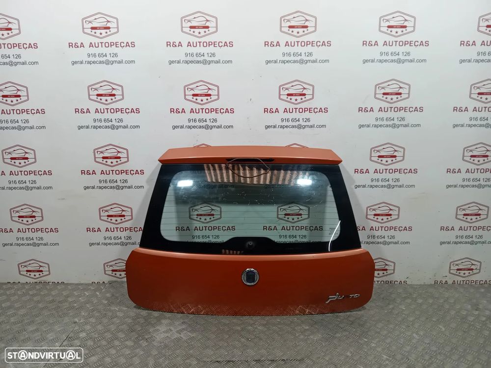 Tampa de Mala Fiat Grand Punto 199 Original