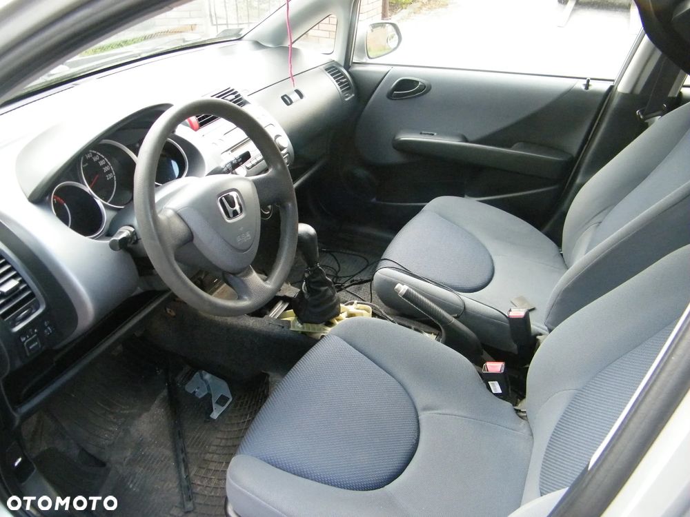 Honda Jazz II (04-08r.) 1.4 B 82KM. Silnik L13A1 Skrzynia SWLM lakier 480 BLUE VITALITY DERIN MAVI. Cały na części. GWARANCJA !!! Przód Tył Zestaw Komplet Drzwi Klapa Zderzak Błotnik Maska Grill Atrapa Szyba Pas Lampa Lusterko Boczki Fotel Kanapa Kokpit Deska Rozdzielcza Przełącznik Włącznik Sterownik Przewody Wiązka Instalacja Moduł Komputer Czujnik Listwa Pompa Alternator Wtryski Głowica Rozrusznik Kompresor Sprzęgło Dwumas Silnik Skrzynia ABS Klimatyzacji Paliwa Wspomagania Kolektor Turbina Przepustnica Zawór Chłodnica Koło Hak Belka Sanki Zawieszenie Mcpherson Półoś Amortyzator Wydech Tłumik Zacisk Most - 7