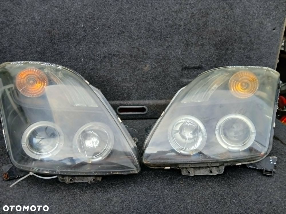 Suzuki Swift III lampa przednia lewa, prawa - 1