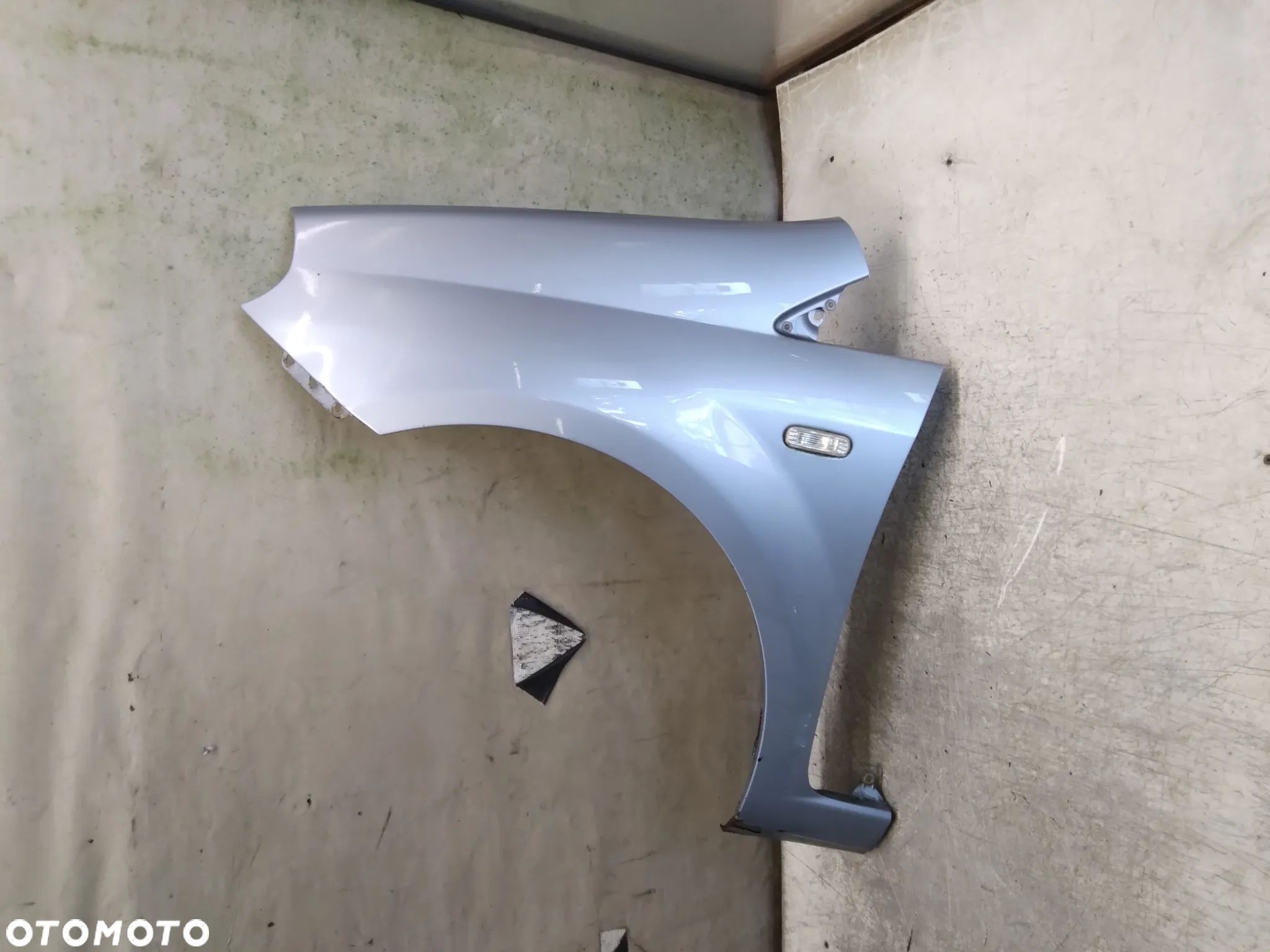 * BŁOTNIK PRZÓD PRZEDNI LEWY FIAT GRANDE PUNTO 457B BŁĘKITNY - 1