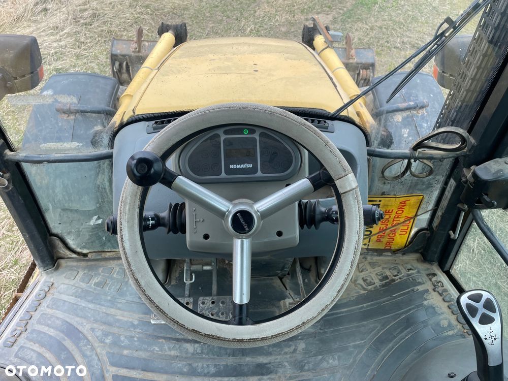 Komatsu WB97S-5E0 - 11