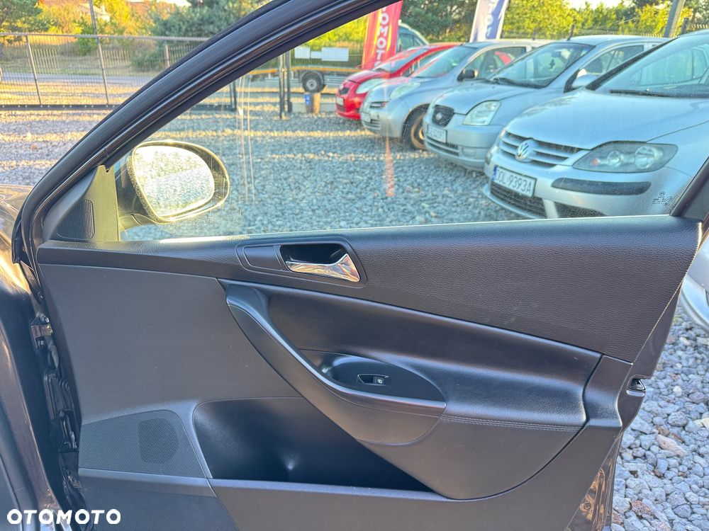 Volkswagen Passat 2.0 TDI Highline - 14