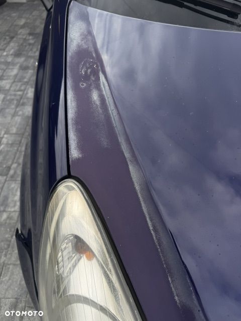 Opel Corsa 1.2 16V Enjoy - 14