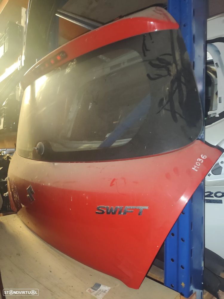 SUZUKI SWIFT - TAMPA DA MALA - M036 - 1