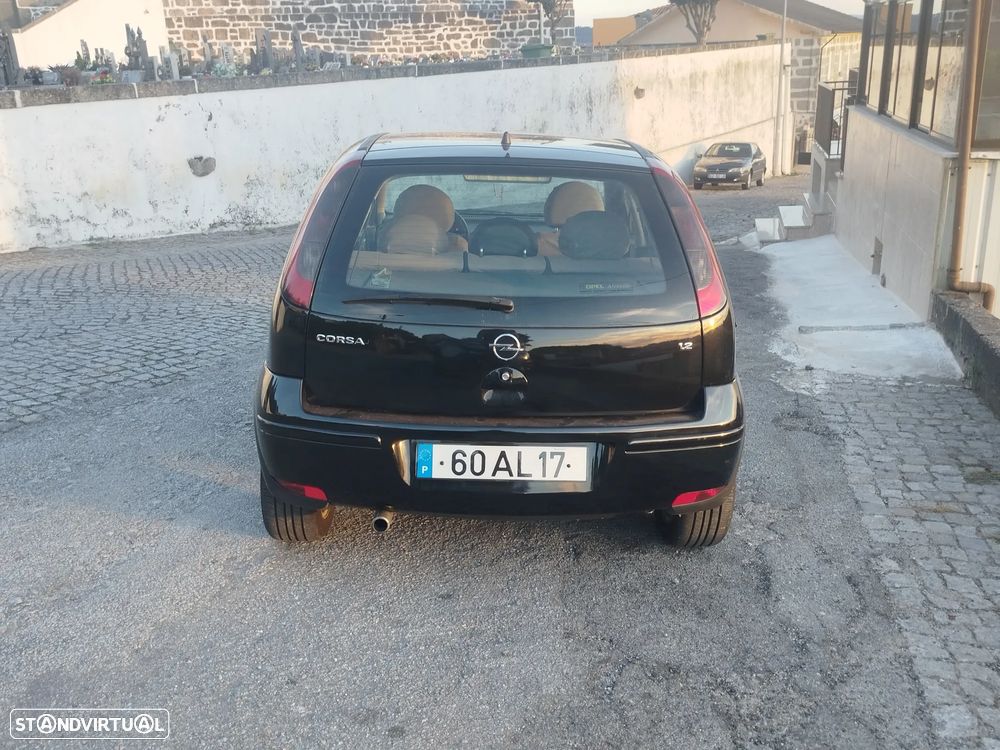 Opel Corsa 1.2 16V Cosmo - 9