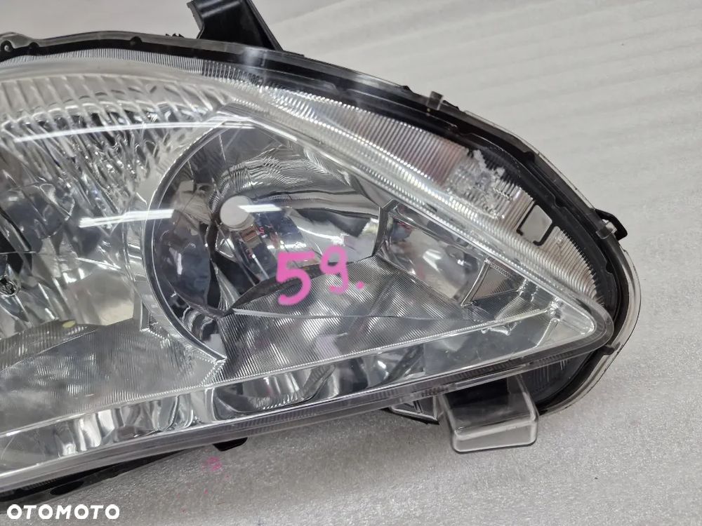 TOYOTA COROLLA E15 LIFT 10- PRAWA LAMPA PRZEDNIA PRZÓD  NR AUKCJI LL59 - 2