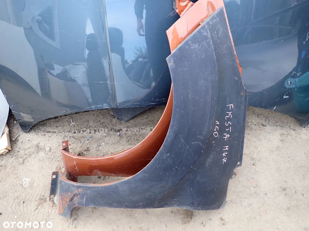 FORD FIESTA MK7 BŁOTNIK LEWY PRZÓD NOWY - 1