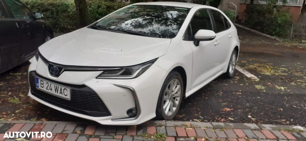 Toyota Corolla TS 1.8 HSD Business - 1