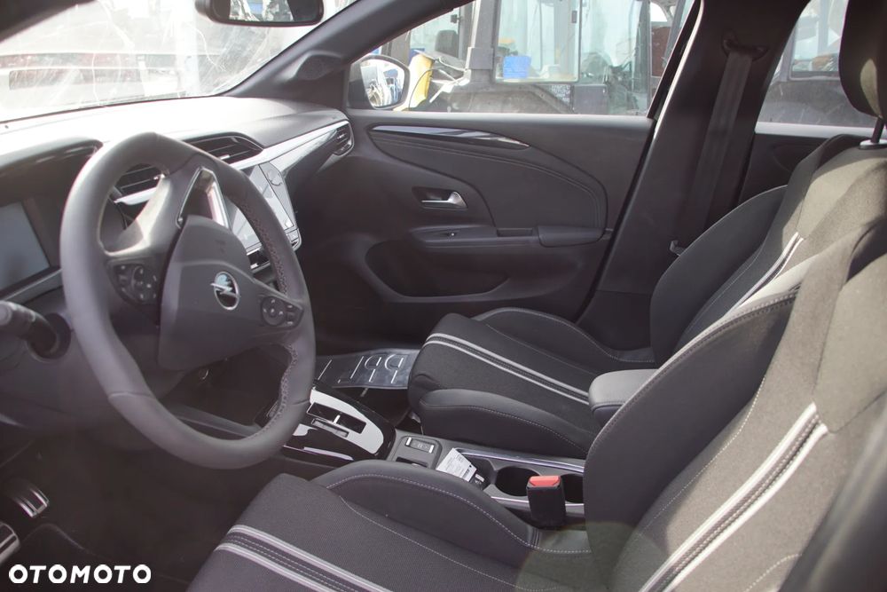 Auto na części - Opel Corsa-e F 100 kW KTV 2023R Falownik Inwerter Bateria Drzwi Klapa Błotnik Lusterko Zderzak Lampa Deska Kokpit Sterownik Moduł Czujnik Wyświetlacz Kierownica Panel - 10
