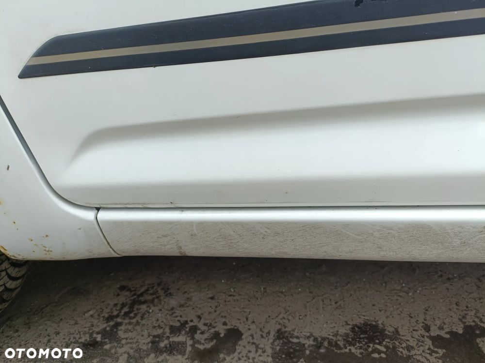 DAIHATU SIRION II 04-10 r. W09 DRZWI lewy przód lewe ** - 4