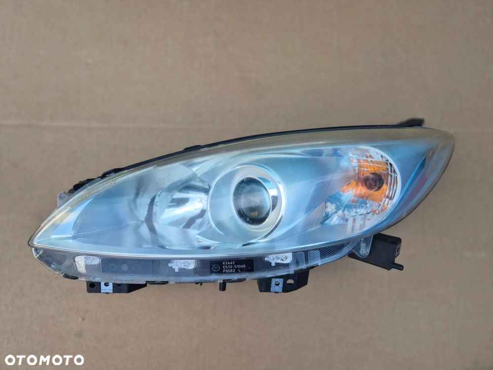 Mazda 5 II lampa lewa.OE.2010-2015. 100% - 1