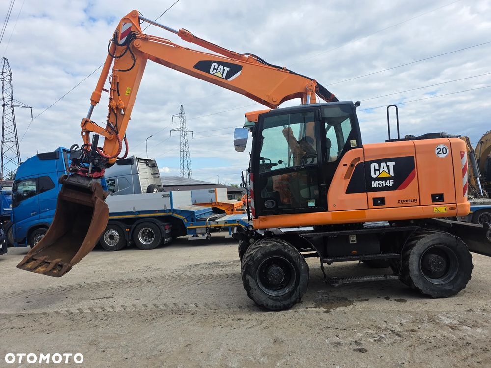 Caterpillar Cat M314F Rototil z Niemiec - 11