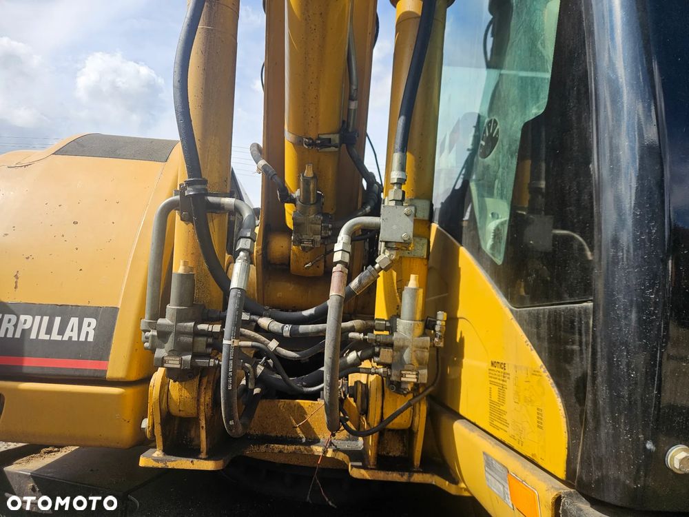 Caterpillar M313c - 6