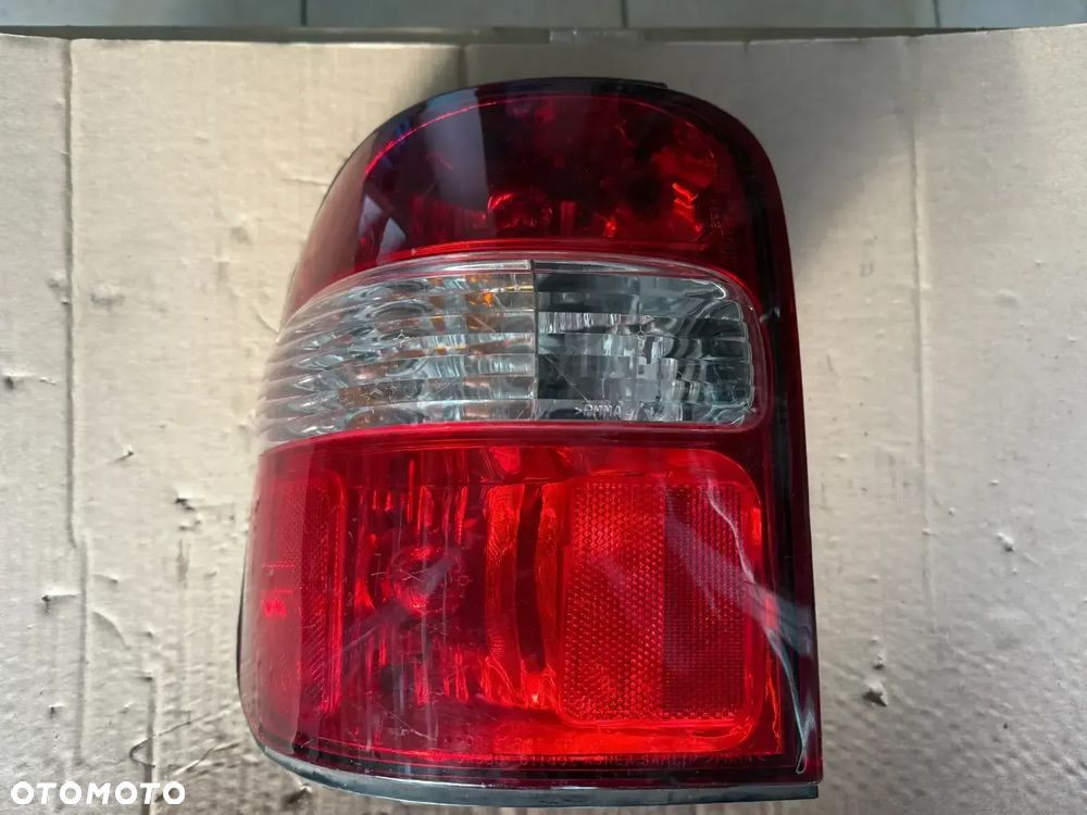 Reflektor / lampa tylna Kia Sportage I LIFT - lewy tył - oryginalna - 1