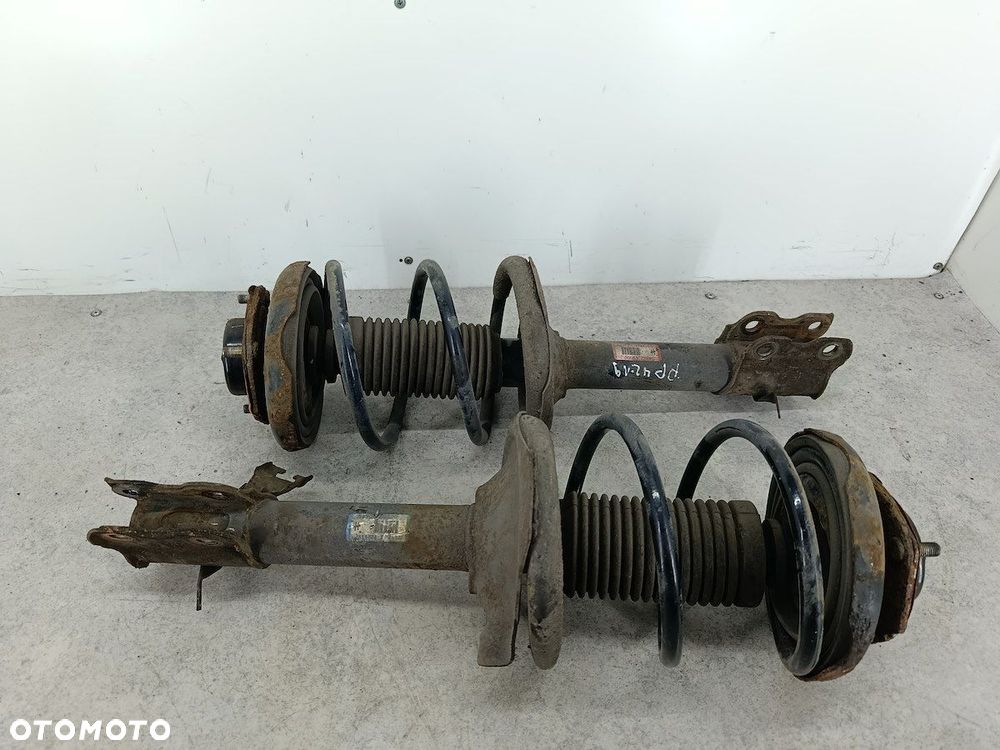 AMORTYZATORY PRZÓD KOMPLET NISSAN X-TRAIL I T30 54303EQ000  54302EQ000 - 2