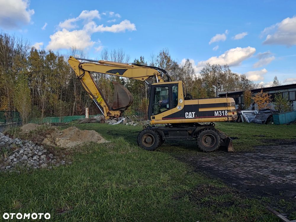 Caterpillar M318 - 5