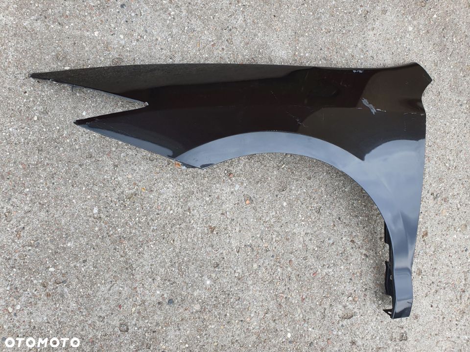 Renault Laguna III Coupe 08- błotnik lewy przedni