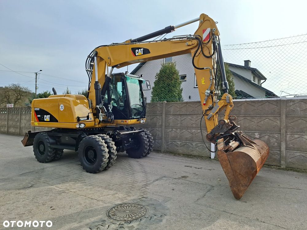 Caterpillar CAT M 313 D - 12