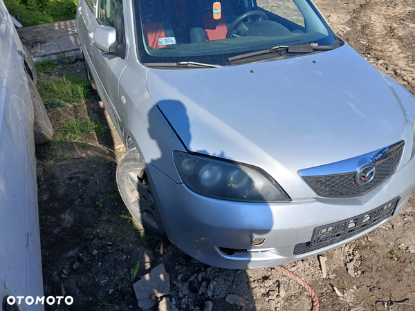mazda 2 silnik 1.6 D skrzynia napęd sanki belka wahacz wahacze zacisk zaciski zwrotnica piasta kopyto
