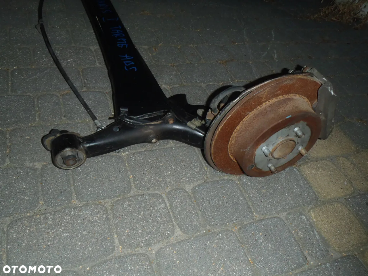 zacisk jarzmo tarcze klocki hamulcowe prowadnica czujnik abs piasta łozysko osłona błotna kotwiczna toyota yaris I 1 98-06r  jak nowe  oryginał - 4