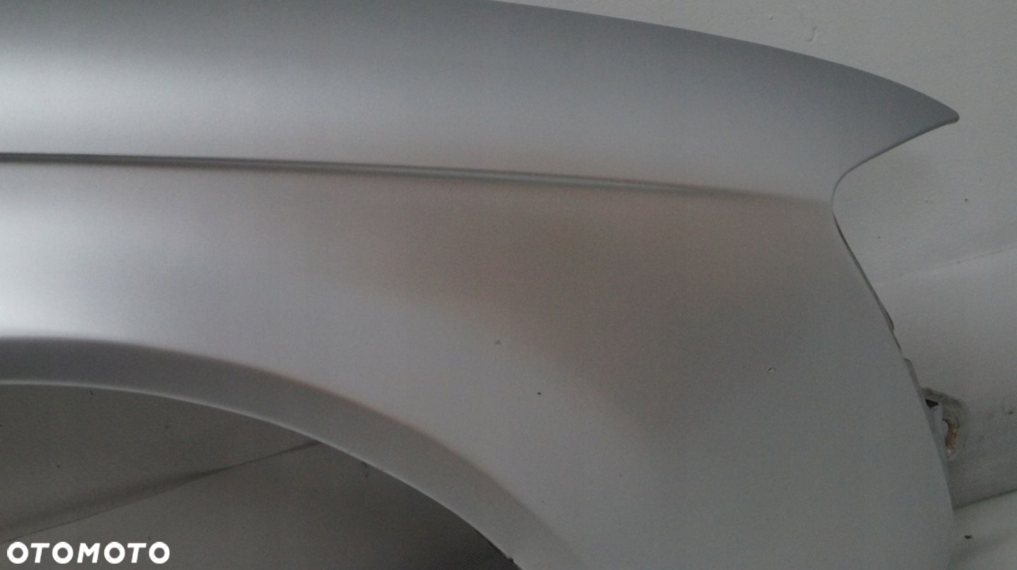 BŁOTNIK PRZEDNI PRAWY AUDI A4 B7 2005 - 2
