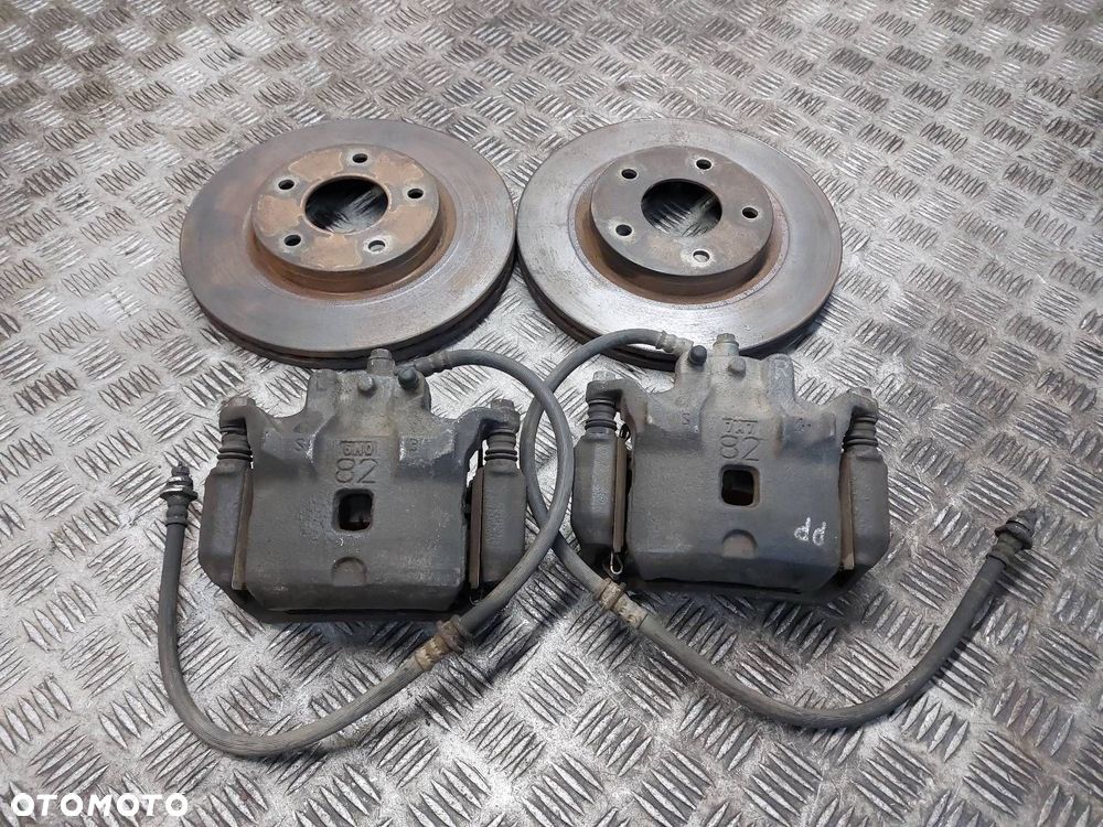 TARCZE HAMULCOWE PRZÓD + KLOCKI + ZACISKI NISSAN PULSAR C13 1.5 DCI - 1