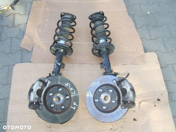 MAZDA CX5 2.2D zwrotnica amortyzator McPherson prawa