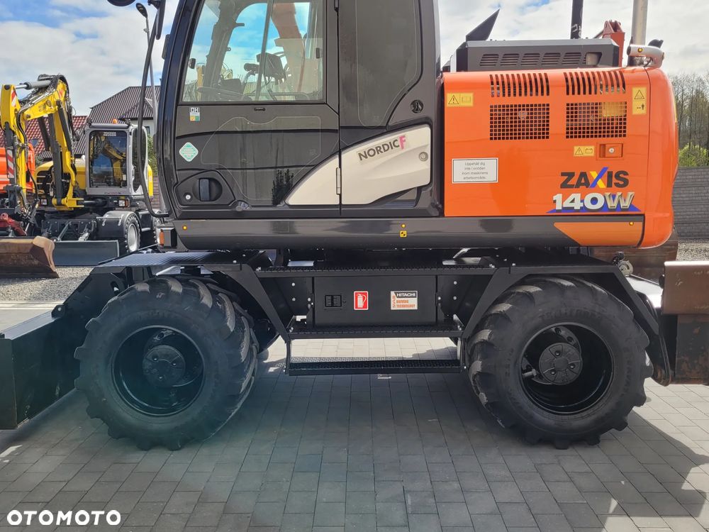 Hitachi ZX 140W / ROTOTILT ze szczypcami / system GPS 3D LEICA / - 8