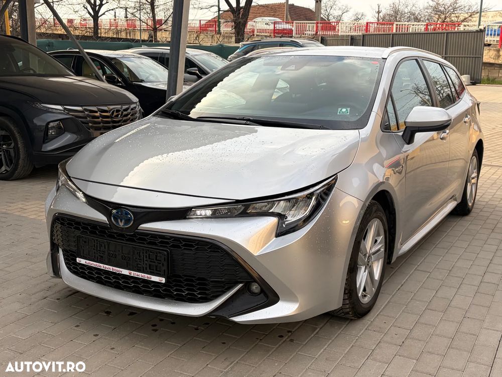 Toyota Corolla 1.8 HSD Business - 14