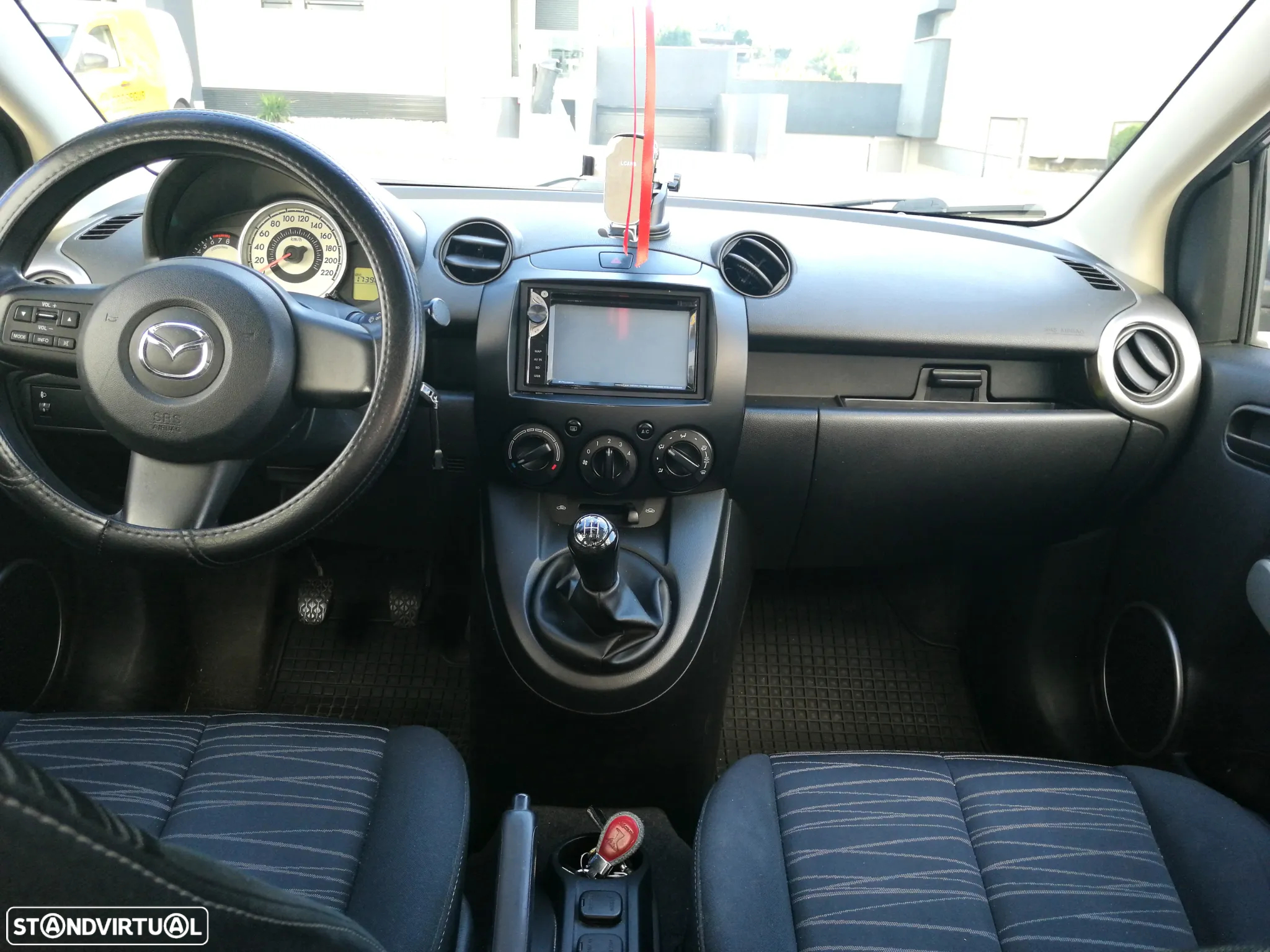 Mazda 2 1.3 MZR Exclusive - 7
