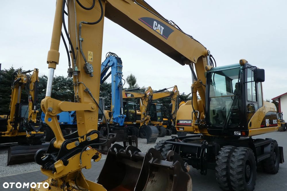 Caterpillar M315C Z NIEMIEC TRZY ŁYZKI - 11