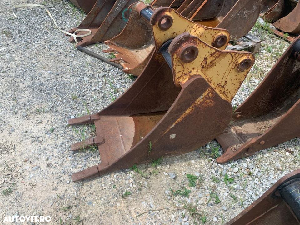Cupa buldoexcavator Caterpillar - 1