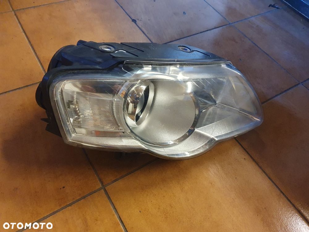 REFLEKTOR PRAWY VW PASSAT B6 HELLA EUROPA - 2